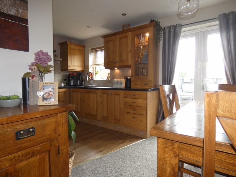 Open plan Lounge/Diner into Kitchen- click for photo gallery